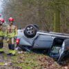 Personenauto op de kop na ongeval Burgemeester Baron van Voorst tot Voorstweg Tilburg